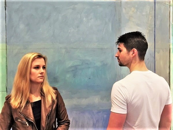 Madi and Zach in front of Richard Diebenkorn's 'Ocean Park #60' at the Anderson Collection at Stanford University